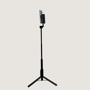 Fliq MagSafe tripod at full height for standing creator filming