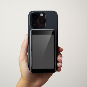 Fliq selfie monitor attached to phone showing live rear camera preview